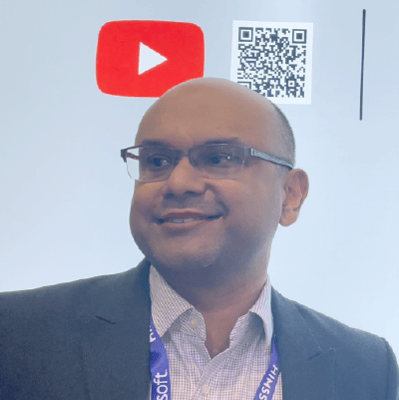 A photo of a man giving a testimonial about Juno EHR